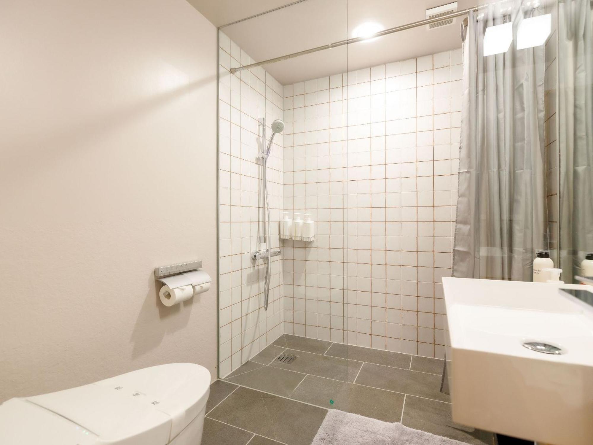 Denpaku Akakina Hotel Amami Quarto foto